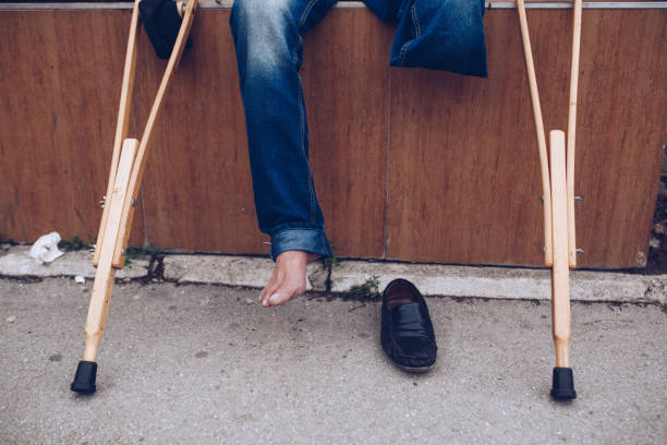 Amsterdam, Netherlands: Wooden shoes on man’s feet.