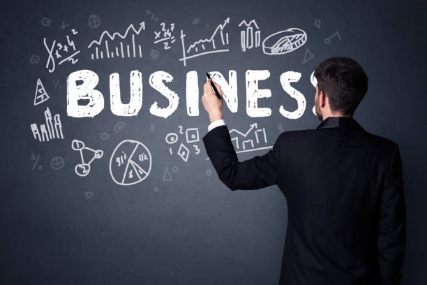 istock Businessman with business plan 879180774