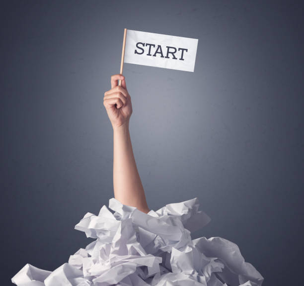 istock Female hand holding start sign 879217846