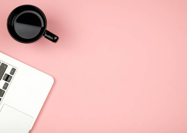 istock Minimal workplace with notebook and copy space on pastel background. Top view. Flat lay. 879223848