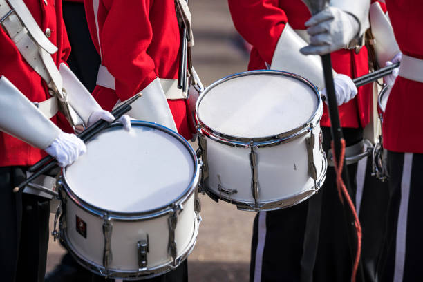 istock Soldiers in red uniforms with drums 879232302