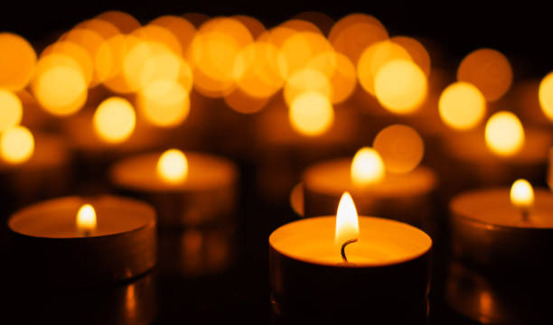istock Burning candles with shallow depth of field 879242758
