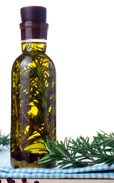 istock olive oil with rosemary 879244194