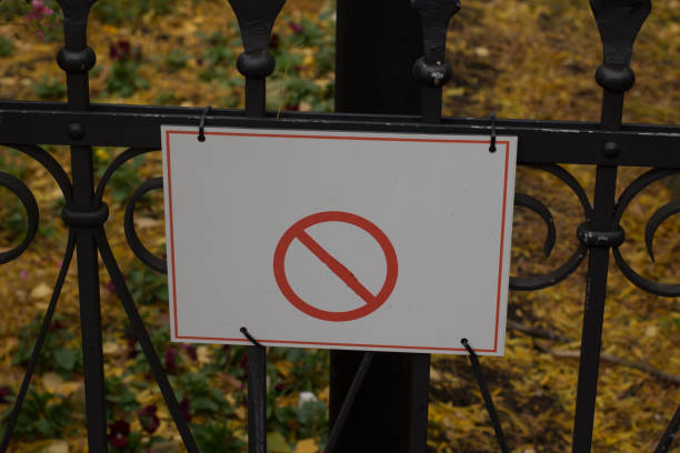 istock dogs not allowed sign at a park on a fence label 879267262