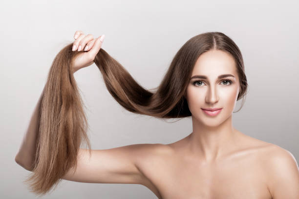 istock woman with long hair. 879268110