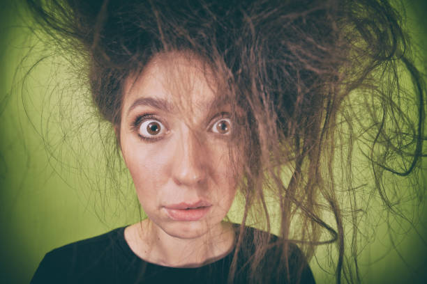 istock girl with a strange hair style 879272486