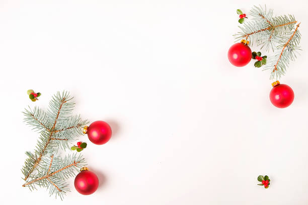 istock Christmas frame composition. Christmas gift,pine branch, red balls, envelope, white wood snowflakes, ribbon and red berries. Top view, flat lay, copy space 879273248