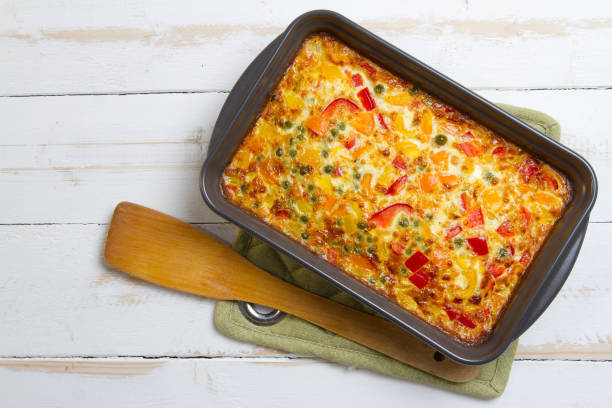 istock Bell peppers and green peas omelete 879276122