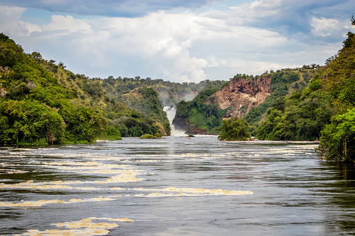 The bottom of the Murchison Falls waterfall reached by a safari boat tour in the national park. Too bad this place, lake Albert, is endangered by oil drilling companies