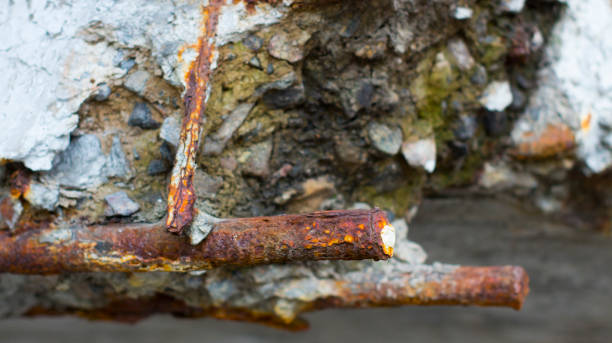 istock Damaged bridge support close-up transportatin concrete 879294020