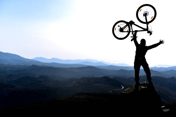 istock cross the majestic mountains with bicycles 879298670