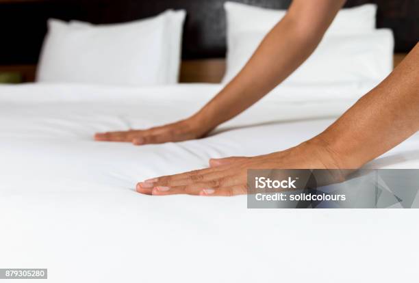 Making Bed Stock Photo - Download Image Now - Bed - Furniture, Sheet - Bedding, Making