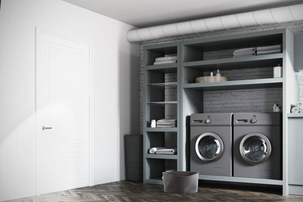 istock Brick laundry room, gray washing machines, side 879318664