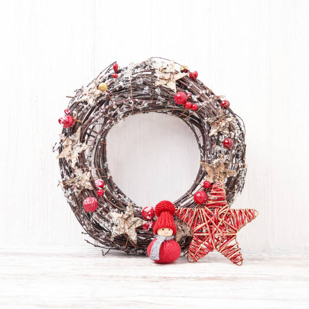 istock White Christmas background.  Christmas wreath with decoration. Copy space 879321604