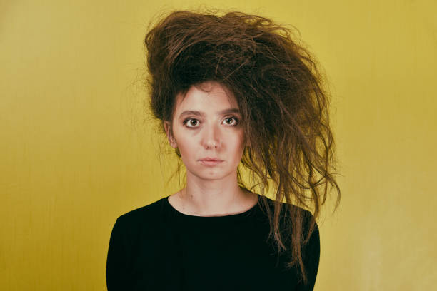 istock girl with a strange hair style 879327208