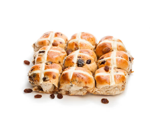 istock Easter  cross buns and sultanas isolated on white background 879331354