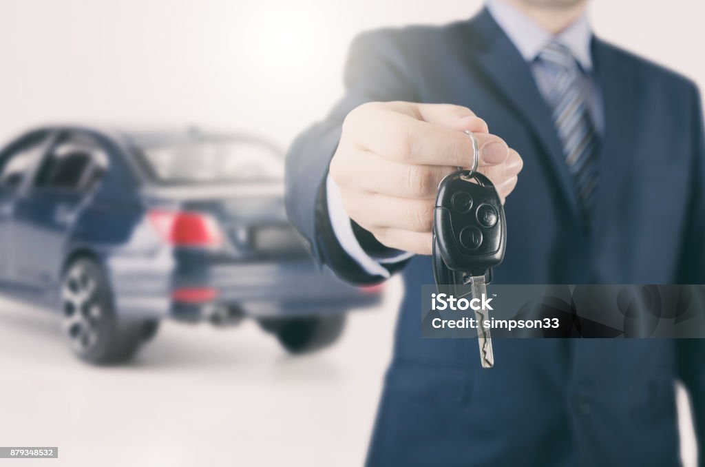 Car rent or sale agent Car rent or sale agent. Auto dealer, leasing concept Car Rental Stock Photo