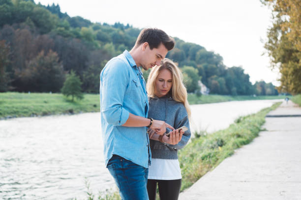 istock Young people looking on the smartphone 879358256