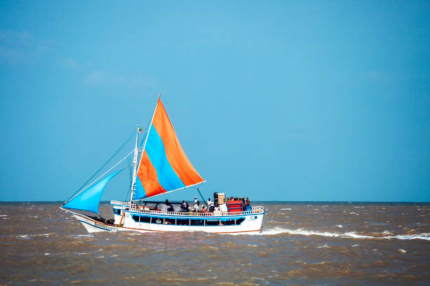 Brazilian passenger boat, Sao Luis Sao Luis, Brazil - February 5, 2013: River transport - sailboat takes passengers from Sao Luis to Alcantara. sao luis stock pictures, royalty-free photos & images