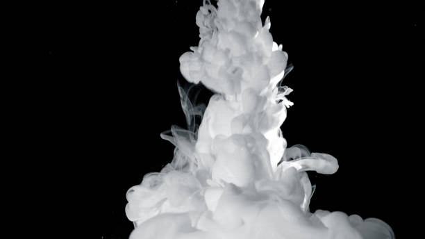 istock Abstract formation of ink in the water 879385432