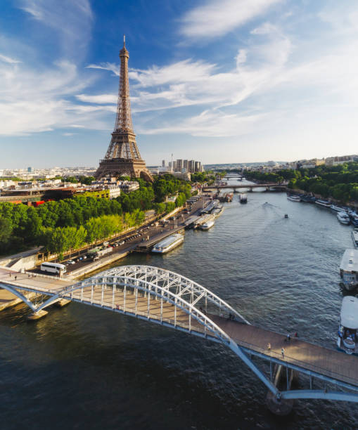 istock Aerial view of Paris with Eiffel tower and Passerelle Debilly bridge 879385464