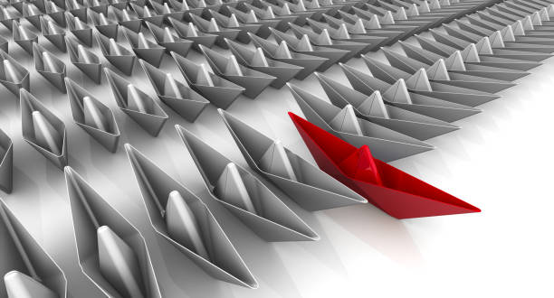 istock Paper ships in the ranks 879390956