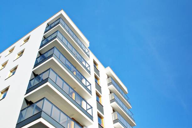 istock Modern apartment buildings on a sunny day with a blue sky. 879393494