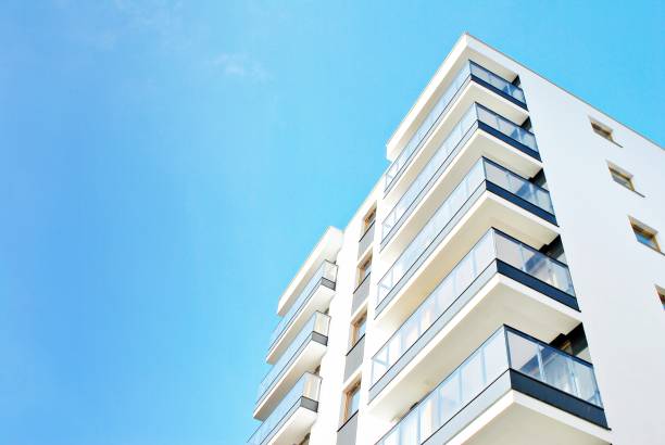 istock Modern apartment buildings on a sunny day with a blue sky. 879395964