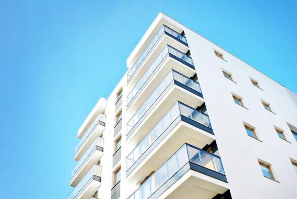 istock Modern apartment buildings on a sunny day with a blue sky. 879402506
