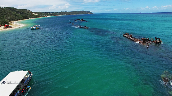 Aerial view of Tangalooma Island shipwrecks and national park in Moreton Bay region, Queensland Australia