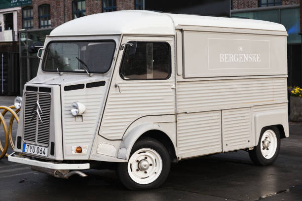 Bergen, Norway - November 14, 2017: White Citroen H Van, 1969 model stands on a roadside, close up photo
