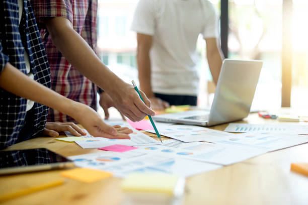 istock group of young business people work together teamwork 879441996