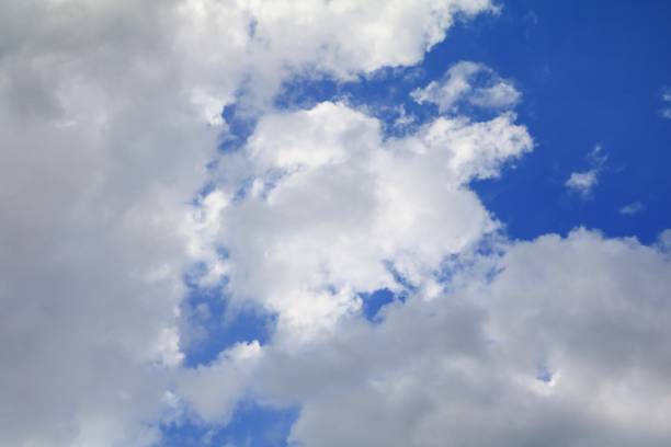 istock blue sky with fluffy cloud bright beautiful art of nature and copy space for add text 879442216