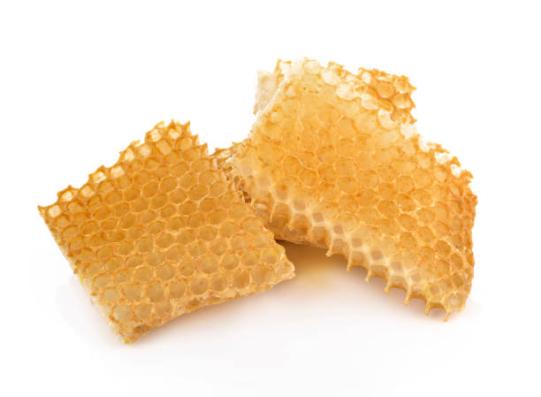 istock Honeycomb close up on a white background 879444796