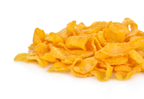 istock Pile of corn flakes, isolated on white background 879444850