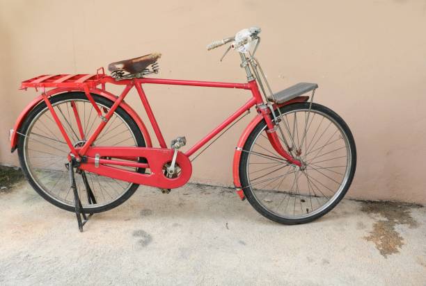 istock bicycle red classic vintage in former  with copy space for add text 879457196