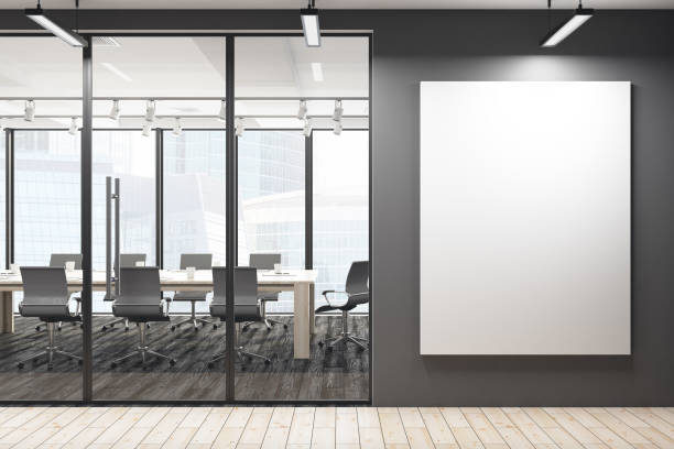 istock Modern meeting room with blank banner 879460124
