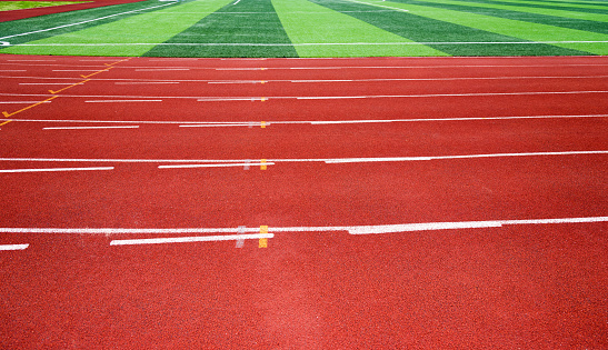 Red running track in sport field
