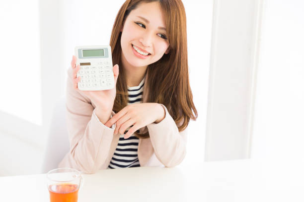 istock businesswoman having an electronic calculator 879466214