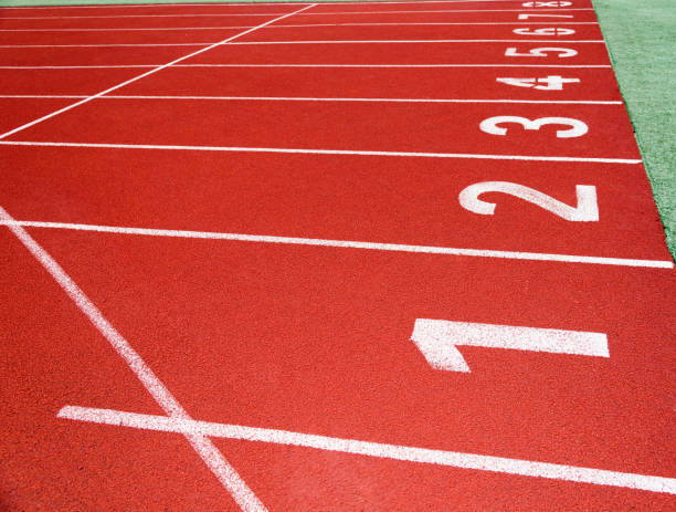 istock Start running track in sport field 879468484