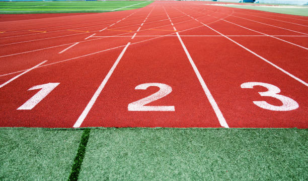 istock Start running track in sport field 879468650