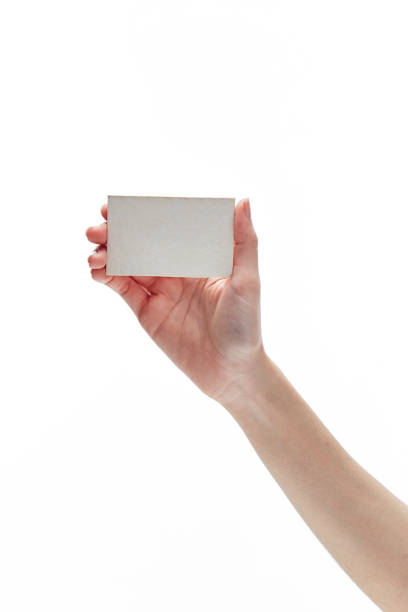 istock Female hand holding card 879468722