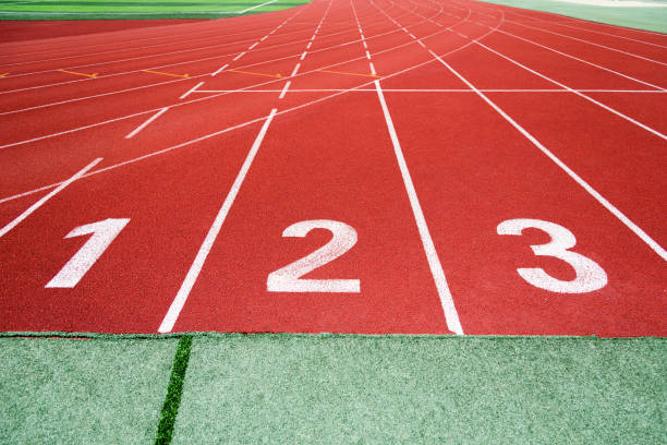 istock Start running track in sport field 879470934