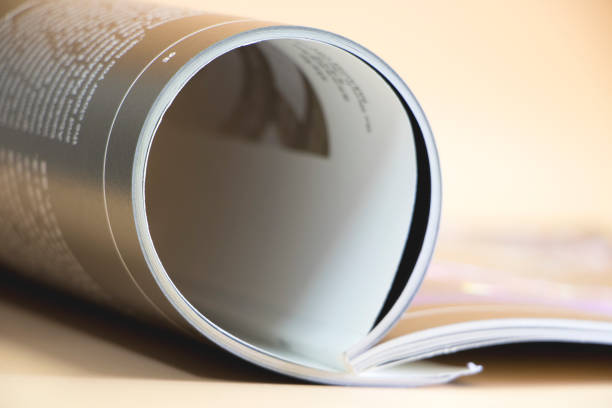 istock Hand over books and magazines 879489314