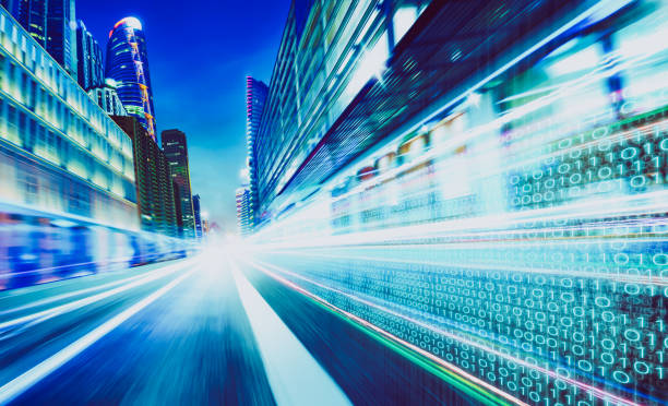 istock City street with binary code numbers on motion blurred asphalt  road , speed and faster digital matrix technology information concept . 879500588