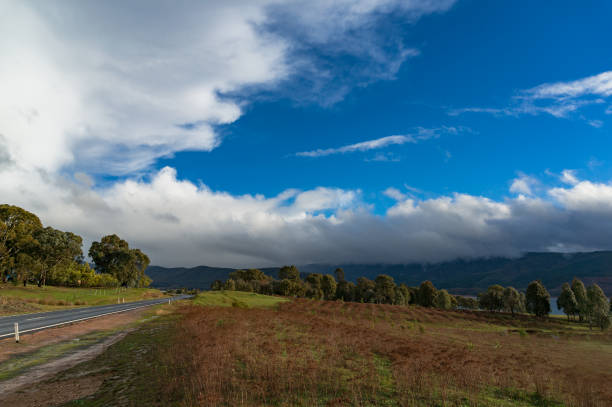 istock Rural background with fields and road, highway 879512858