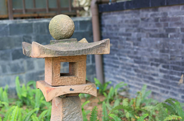 Chinese stone lantern in the public park.