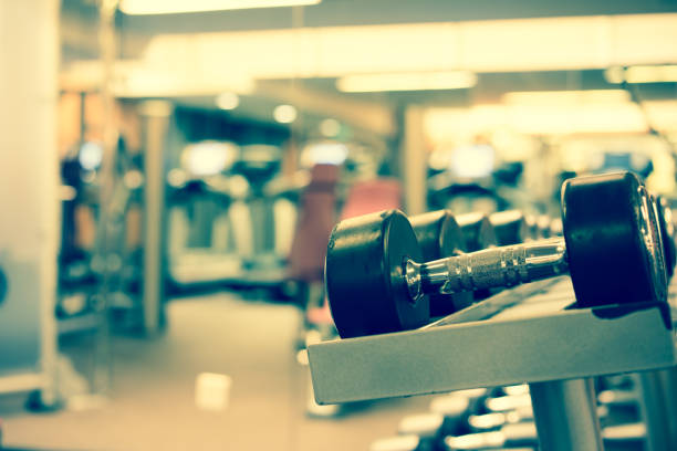 istock Fitness club weight training equipment 879513100