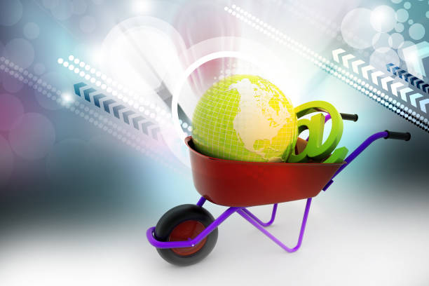 istock Wheelbarrow carrying earth and email sign 879521142
