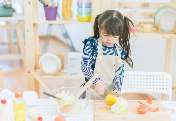 istock Little girl chef. 879521354